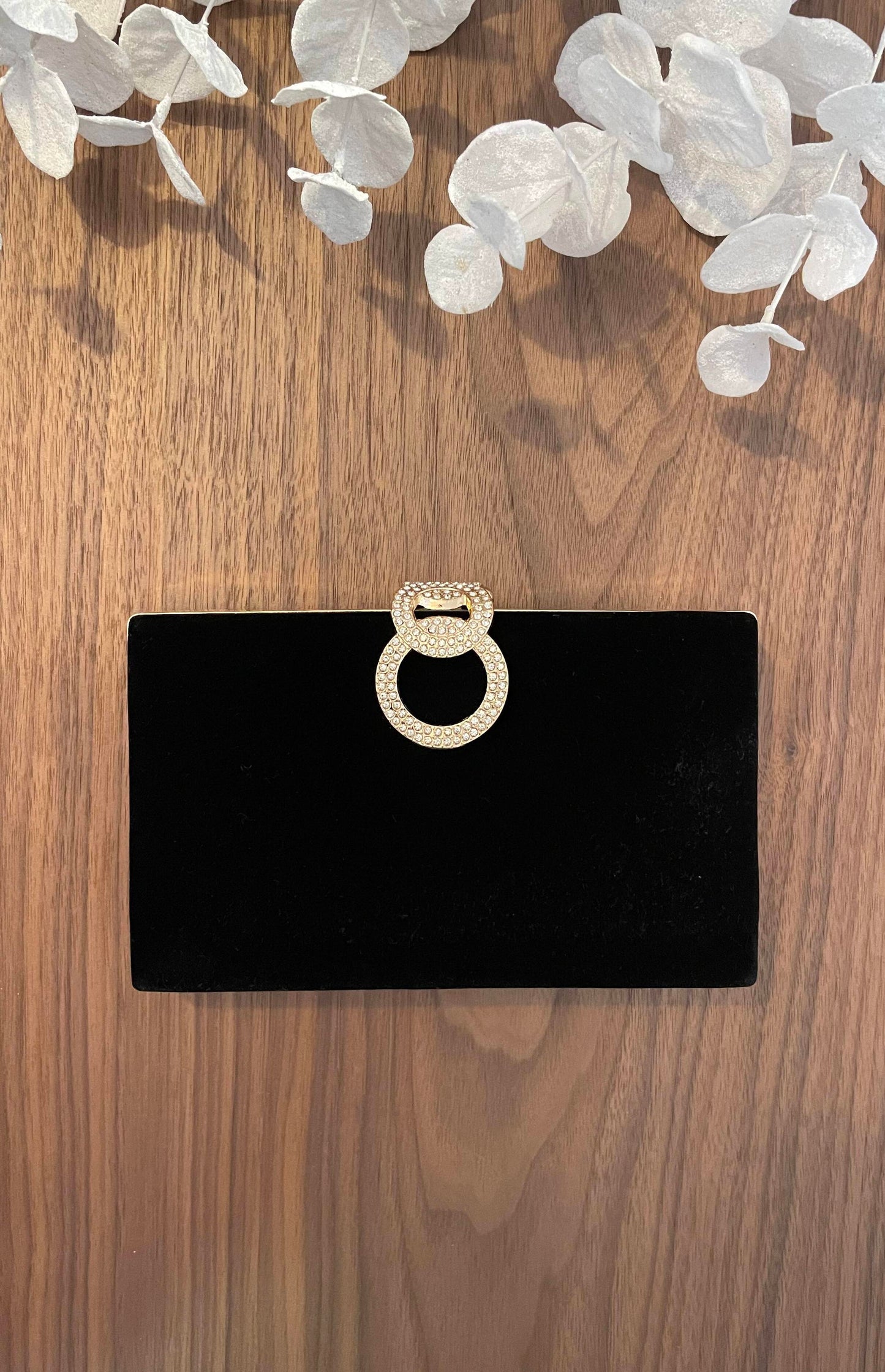 Pochette noire fermoir bijou