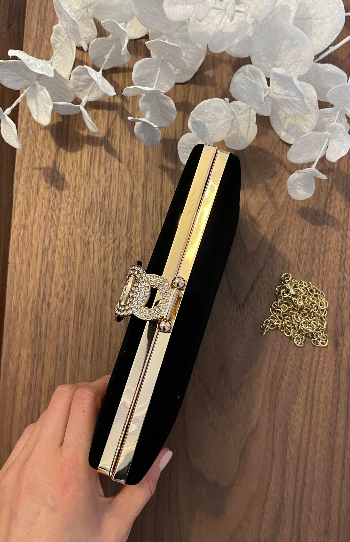 Pochette noire fermoir bijou